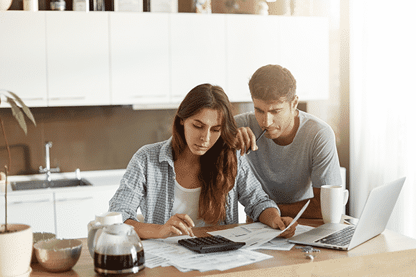 couple looking at loan application